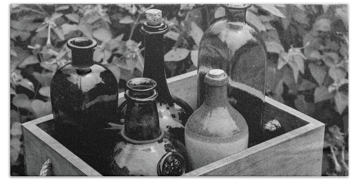 Antique Hand Towel featuring the photograph Glass Bottles in the Garden by Nicole Lloyd