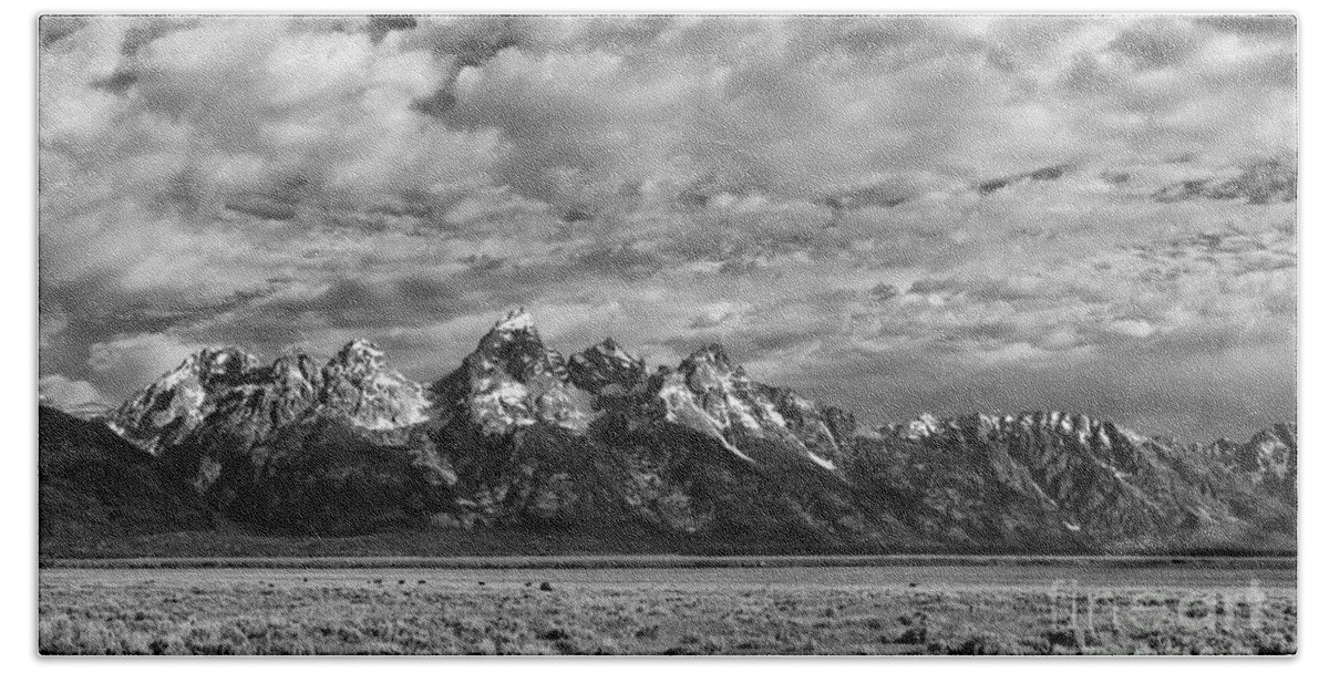 B&w;b+w;black & White;black;white;monochrome;grand Teton;wyoming;mountains;clouds;atmospheric;grand Tetons;scenic;landscape;summer;landscapes;scenics;cloudscape;nature;sandra Bronstein;fine Art;photography;photographs;horizontal;horizontals;monochromes;black And Whites;iconic;tourism;travel;west;western United States;out West;snowcapped;western Landscape;prints;canvas;acrylic;metallic;metal;greeting Cards;notecards;national Park;national Parks;landmark;landmarks; Hand Towel featuring the photograph Grand Teton Majesty by Sandra Bronstein