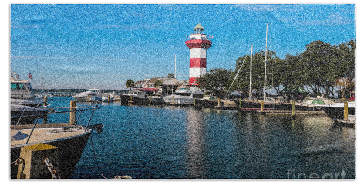 Harbor Town Bath Towel featuring the photograph Harbourtown Lighthouse and Harbor by Thomas Marchessault