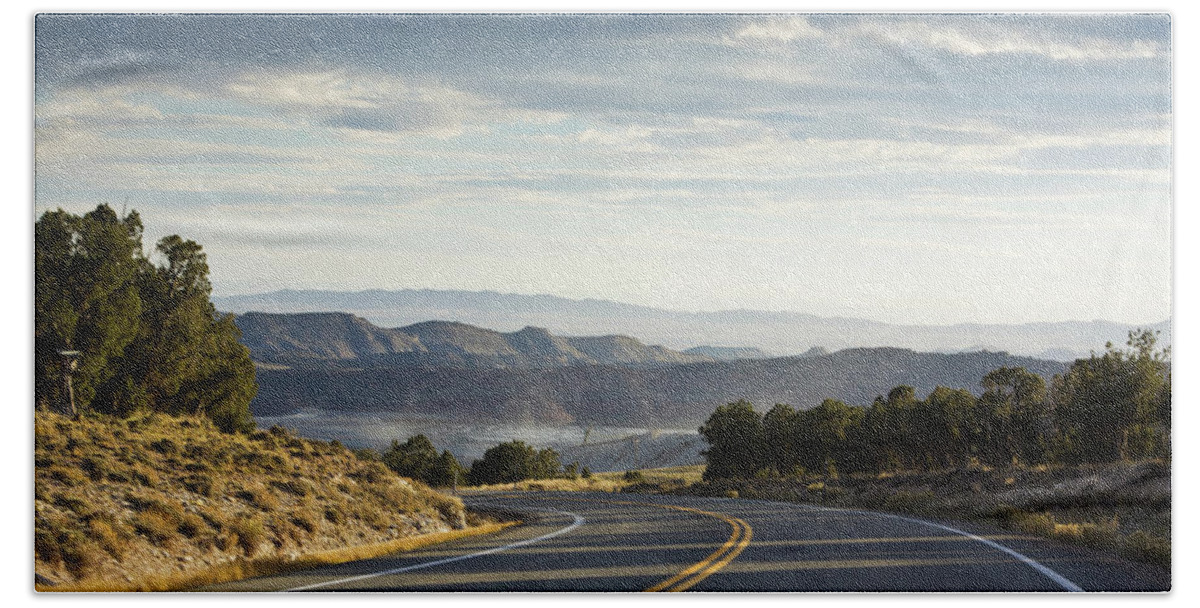 Country Road Bath Towel featuring the photograph Heading Flaming Gorge Reservoir, Utah by Tatiana Travelways