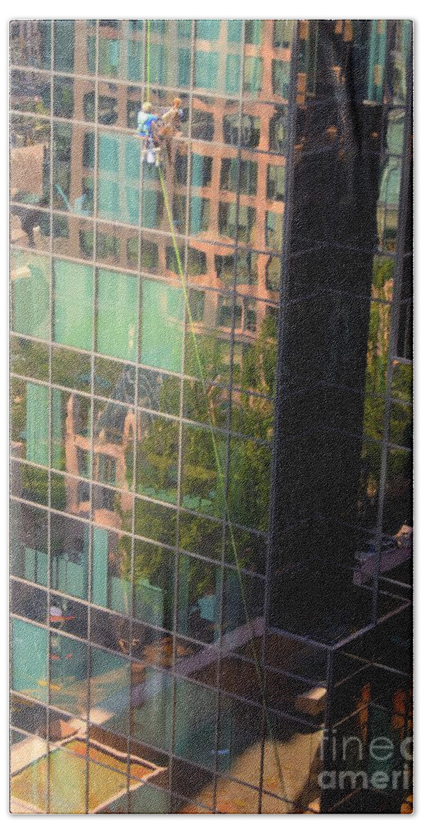 High Hand Towel featuring the photograph High rise window cleaner by David Birchall