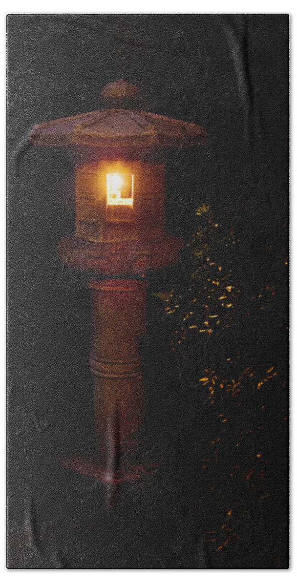 Garden Bath Towel featuring the photograph Japanese Lantern shines in the dark by John Christopher
