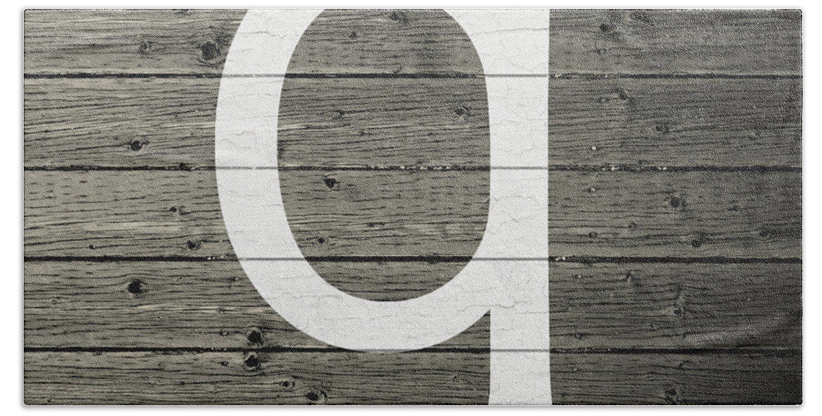 Letter Hand Towel featuring the mixed media Letter Q White Paint Peeling from Wood Planks by Design Turnpike