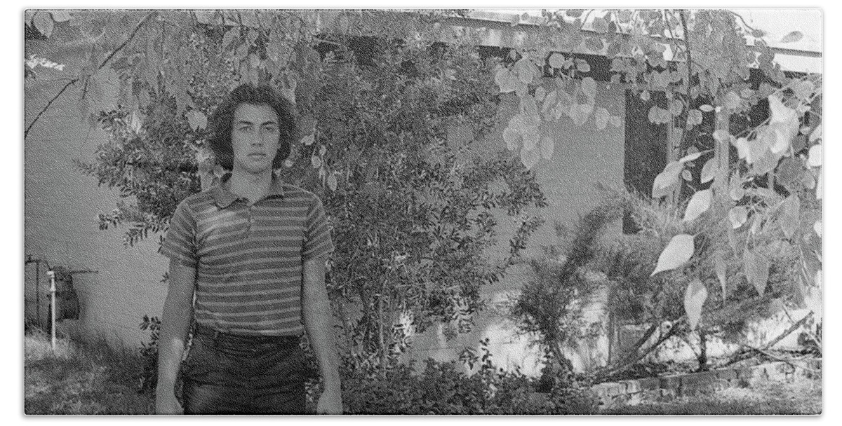 Phoenix Bath Towel featuring the photograph Man in Front of Cinder-block Home, 1973 by Jeremy Butler