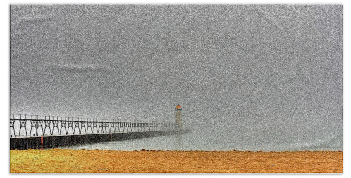 Lighthouse Hand Towel featuring the photograph Manistee Light and Fog by Randy Pollard