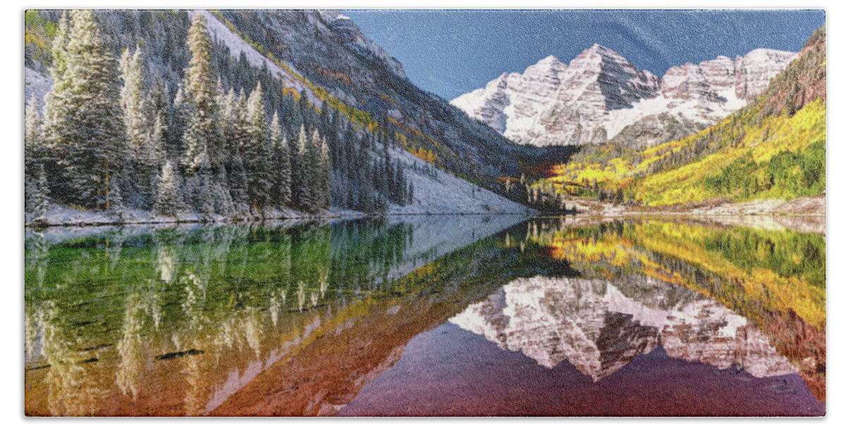 Olena Art Hand Towel featuring the photograph Sunrise at Maroon Bells Lake Autumn Aspen Trees in The Rocky Mountains Near Aspen Colorado by OLena Art