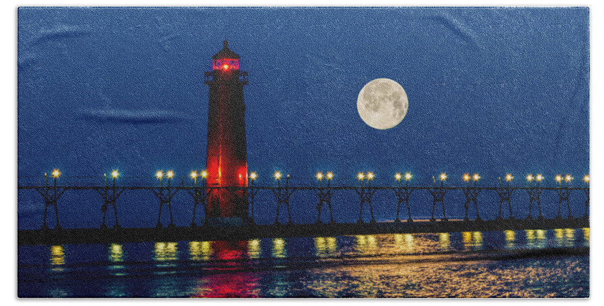 Grand Haven Bath Towel featuring the photograph Moon over Grand Haven by Nick Zelinsky Jr