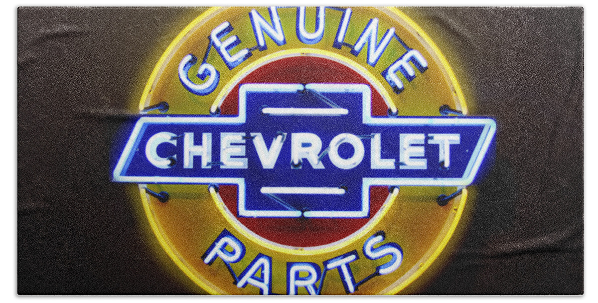 Neon Sign Bath Towel featuring the photograph Neon Genuine Chevrolet Parts Sign by Mike McGlothlen