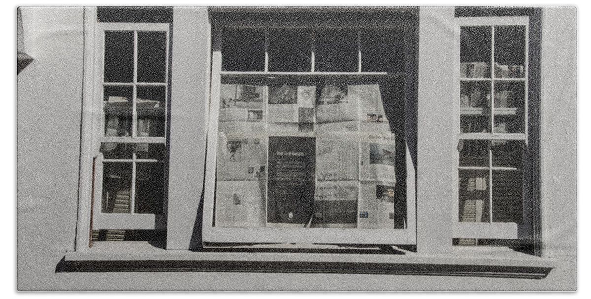Shadow Bath Towel featuring the photograph Newspaper Window by Erik Burg