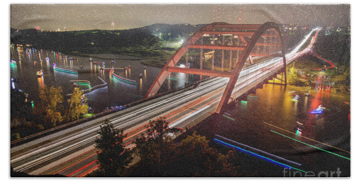 Loop 360 Boat Ramp Park Bath Towel featuring the photograph Nighttime boats cruise up and down the Loop 360 Bridge, a boater by Dan Herron