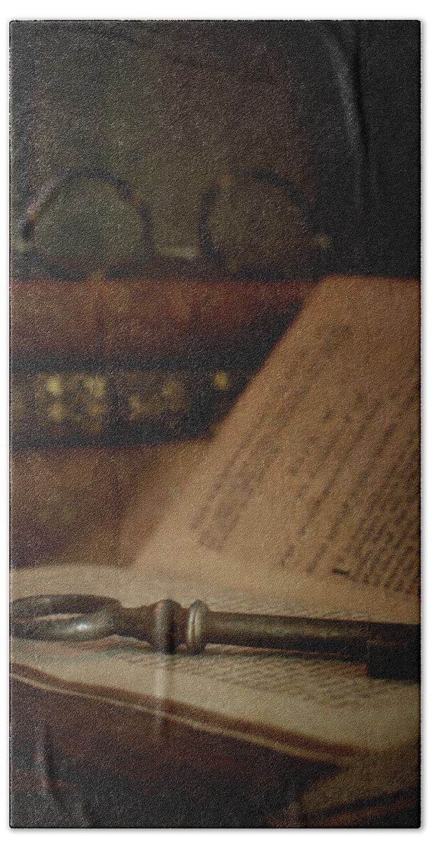 Old Hand Towel featuring the photograph Old Book With Key by Ethiriel Photography