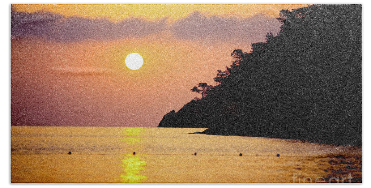 Sunset Bath Towel featuring the photograph Orange sunrise above sea by Raimond Klavins