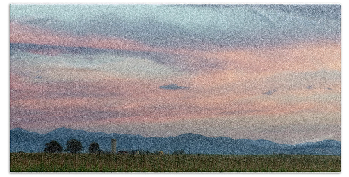 Sunrise Hand Towel featuring the photograph Pastel Clouds Over a Colorado Farm by Tony Hake