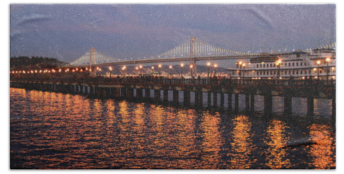 Bonnie Follett Hand Towel featuring the photograph Pier 7 and Bay Bridge Lights at Sunset by Bonnie Follett