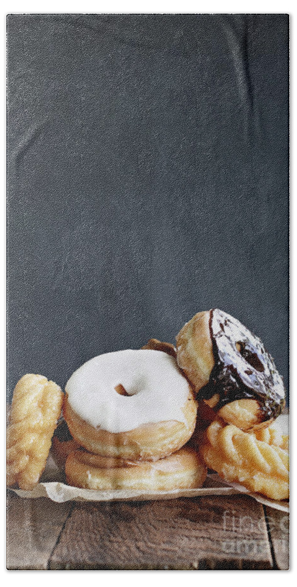 Food Bath Towel featuring the photograph Pile of Donuts by Stephanie Frey