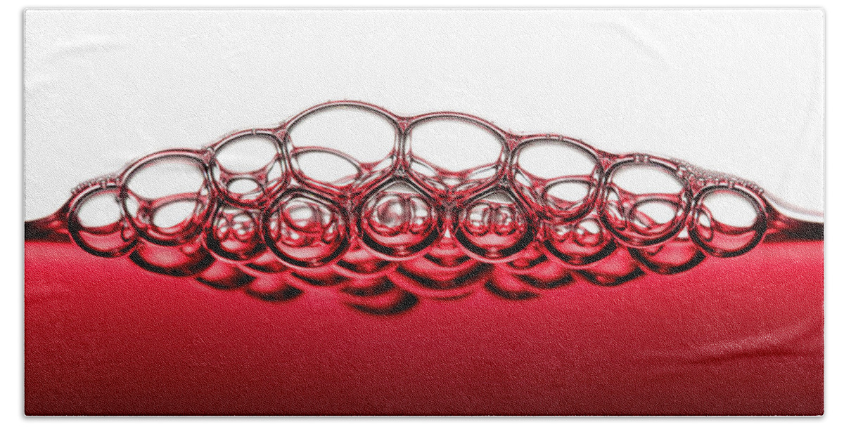 Red Hand Towel featuring the photograph Red Wine Bubbles by Johan Swanepoel