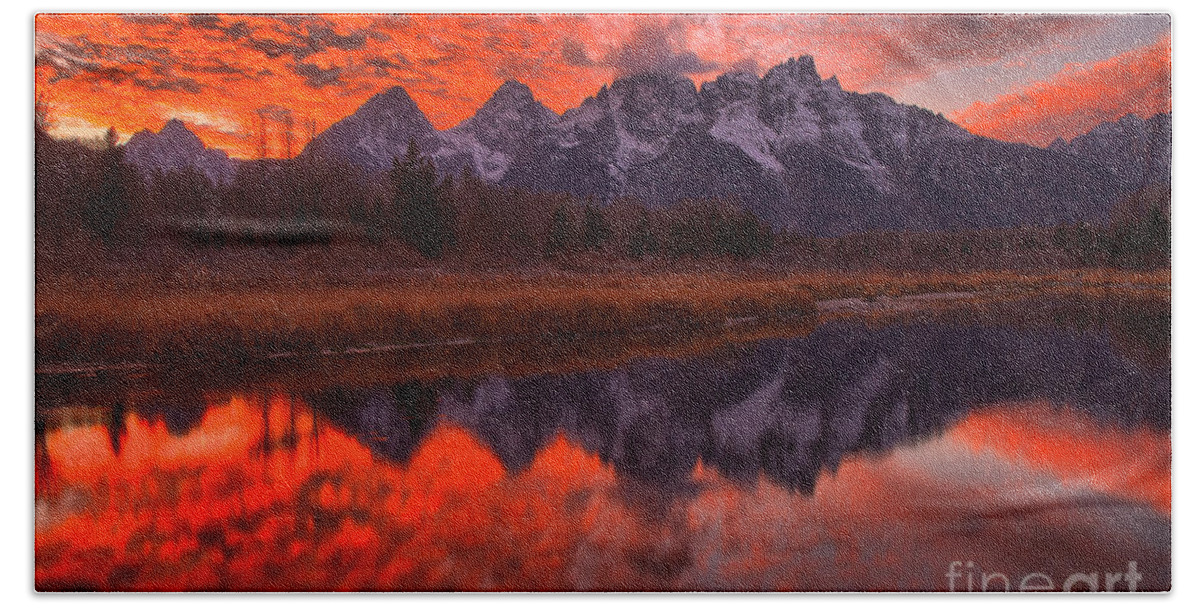 Schwabacher Landing Bath Towel featuring the photograph Reflections Of Orange In The Snake River by Adam Jewell