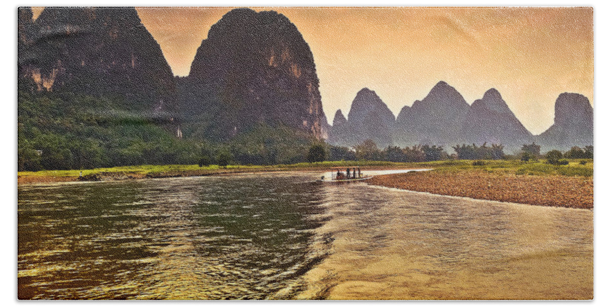Sunset Bath Towel featuring the photograph Riverside scenery like gold-China Guilin scenery Lijiang River in Yangshuo by Artto Pan