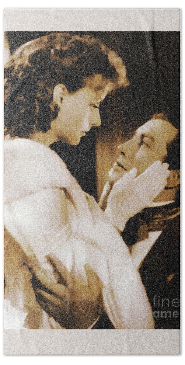 Greta Garbo Hand Towel featuring the photograph Robert Taylor And Greta Garbo by Ian Gledhill