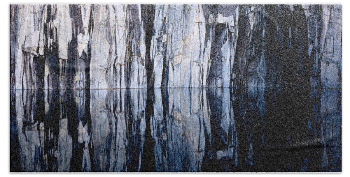Photography Hand Towel featuring the photograph Rock Formations Reflected In A Lake by Panoramic Images