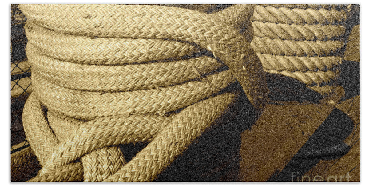 Rope Bath Towel featuring the photograph Rope tied to a large ship by Micah May