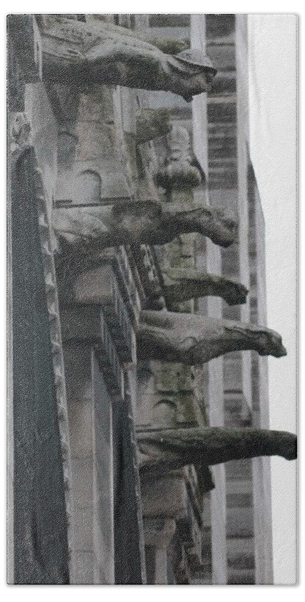 Gargoyles Hand Towel featuring the photograph Row of gargoyles by Christopher J Kirby