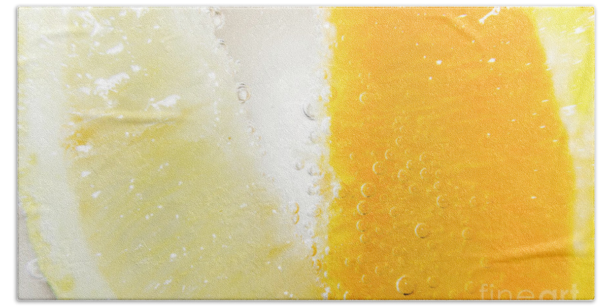 Closeup Bath Towel featuring the photograph Slice of orange and lemon in cocktail glass by Jorgo Photography