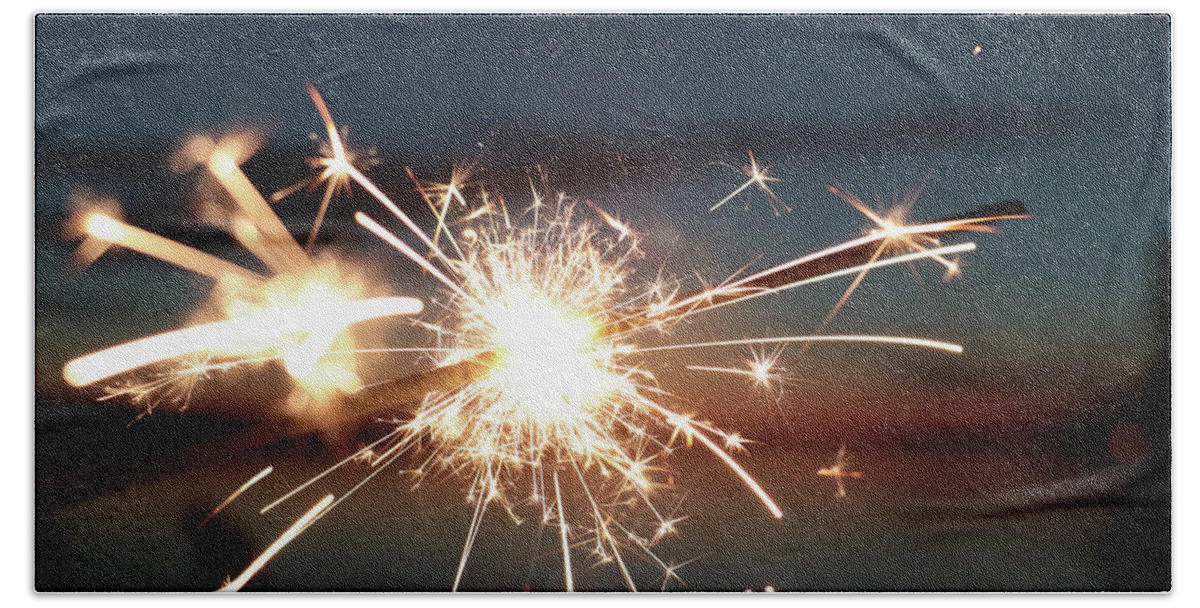 Kelly Hazel Bath Towel featuring the photograph Sparklers After Sunset by Kelly Hazel