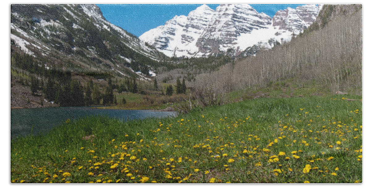 Rocky Mountains Hand Towel featuring the photograph Spring at the Maroon Bells by Cascade Colors