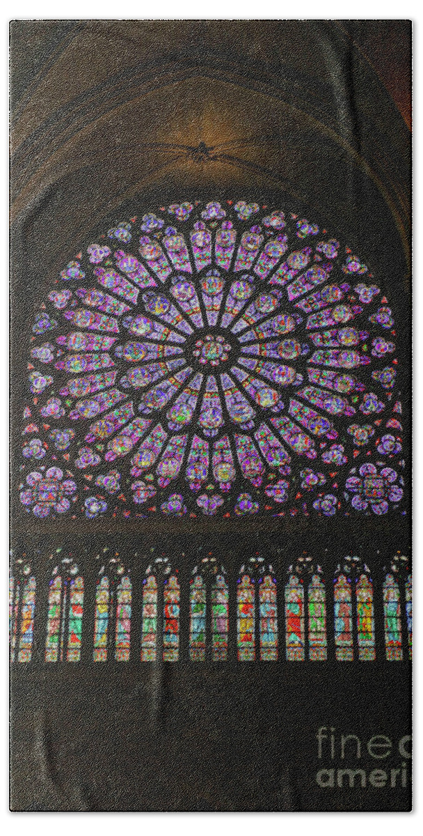 Antique Bath Towel featuring the photograph Stained glass window of the Notre Dame by Patricia Hofmeester
