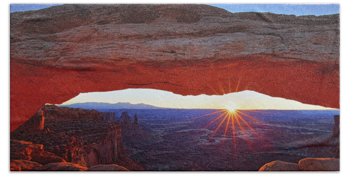 Mesa Bath Towel featuring the photograph Starburst sunrise at Mesa Arch in Canyonlands National Park by Jetson Nguyen