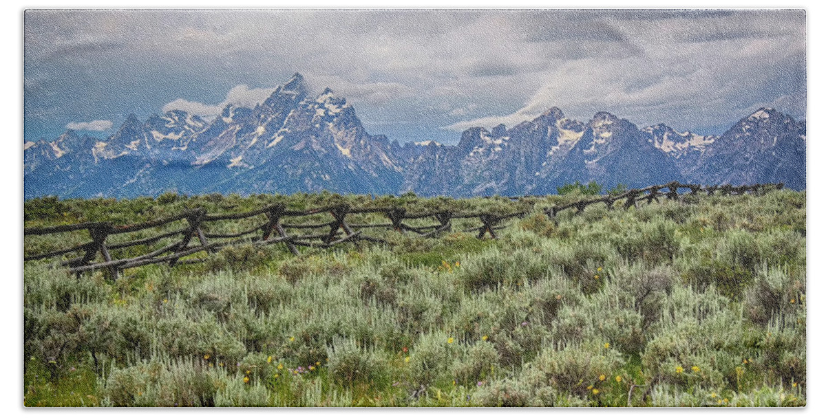 Grand Tetons Bath Towel featuring the photograph Stormy Grand Tetons and a Fence by Teresa Zieba