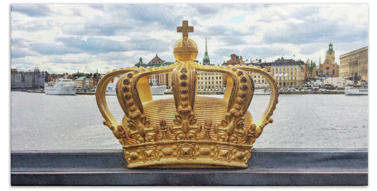 Stockholm Bath Towel featuring the photograph Swedish royal crown on a bridge in Stockholm by GoodMood Art