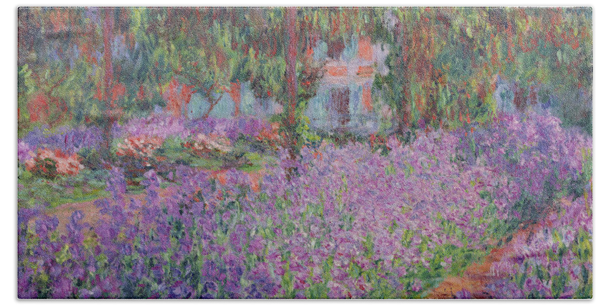 The Hand Towel featuring the painting The Artists Garden at Giverny by Claude Monet