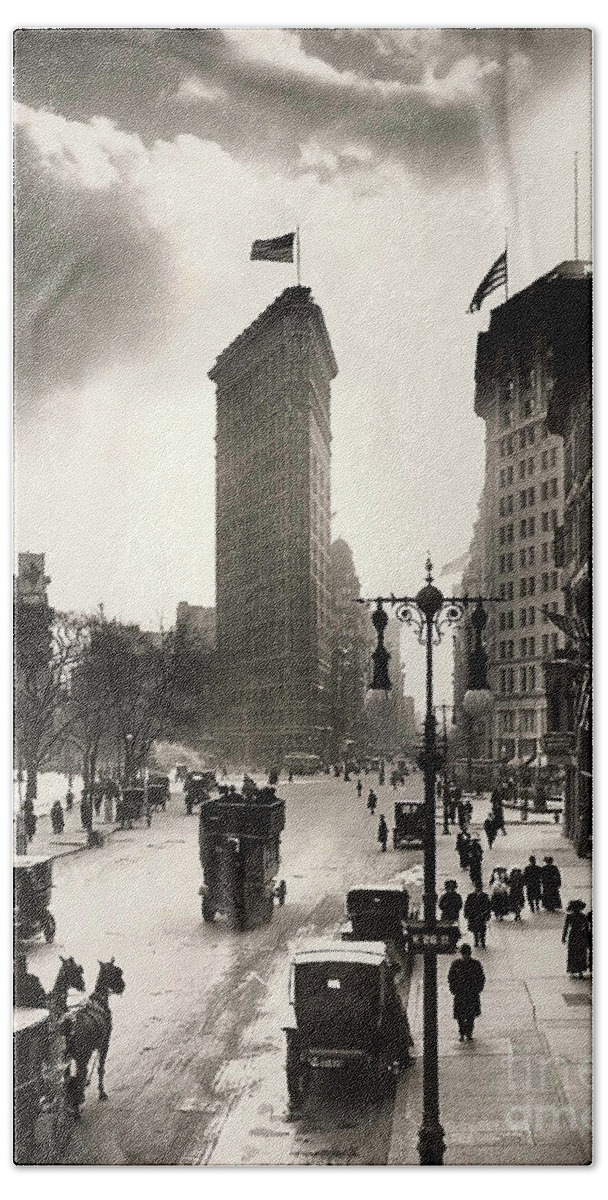 Times Square Hand Towel featuring the photograph The Flatiron Building by Jon Neidert