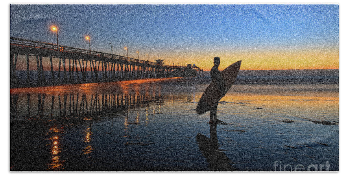 Imperial Beach Bath Towel featuring the photograph The lone surfer at the Imperial Beach Pier by Sam Antonio