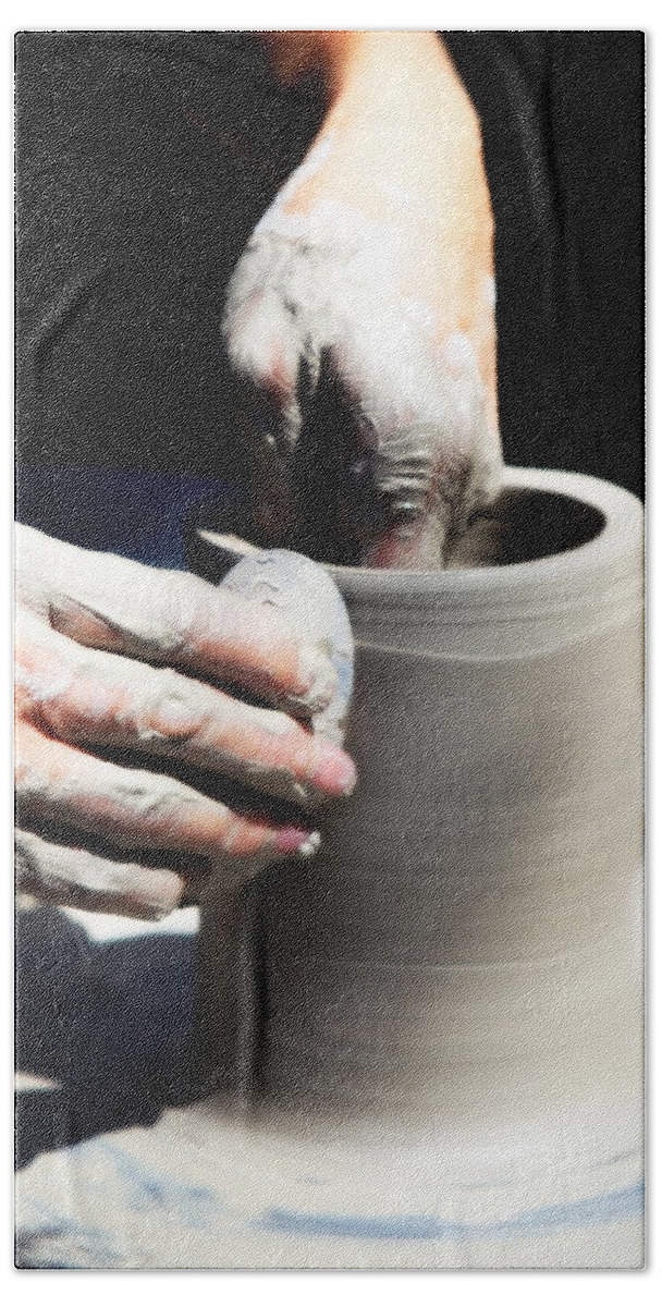 Potter Hand Towel featuring the photograph The Potters Wheel by Imagery-at- Work