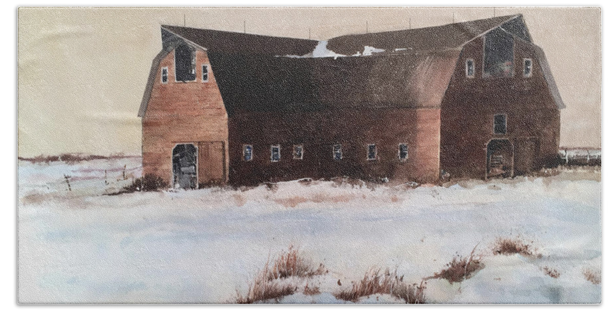 A Large Barn Sets In The Snow Covered Fields Of North Dakota. Bath Towel featuring the painting The Red Barn by Monte Toon