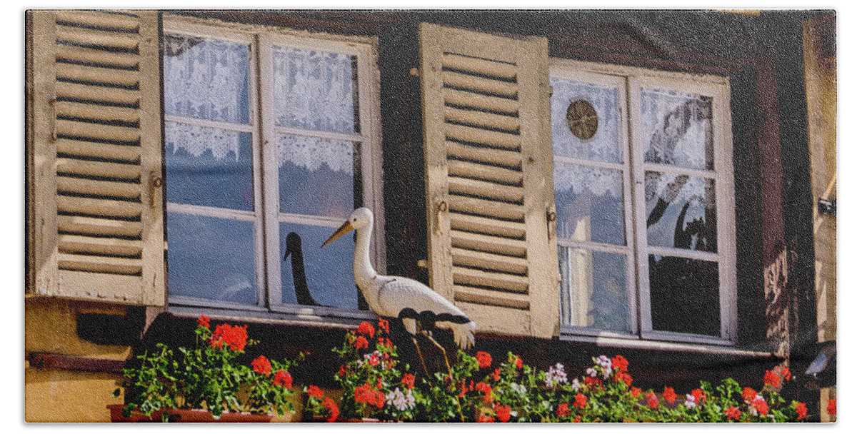 Stork Hand Towel featuring the photograph The Stork Has A Delivery - Colmar France by Jon Berghoff