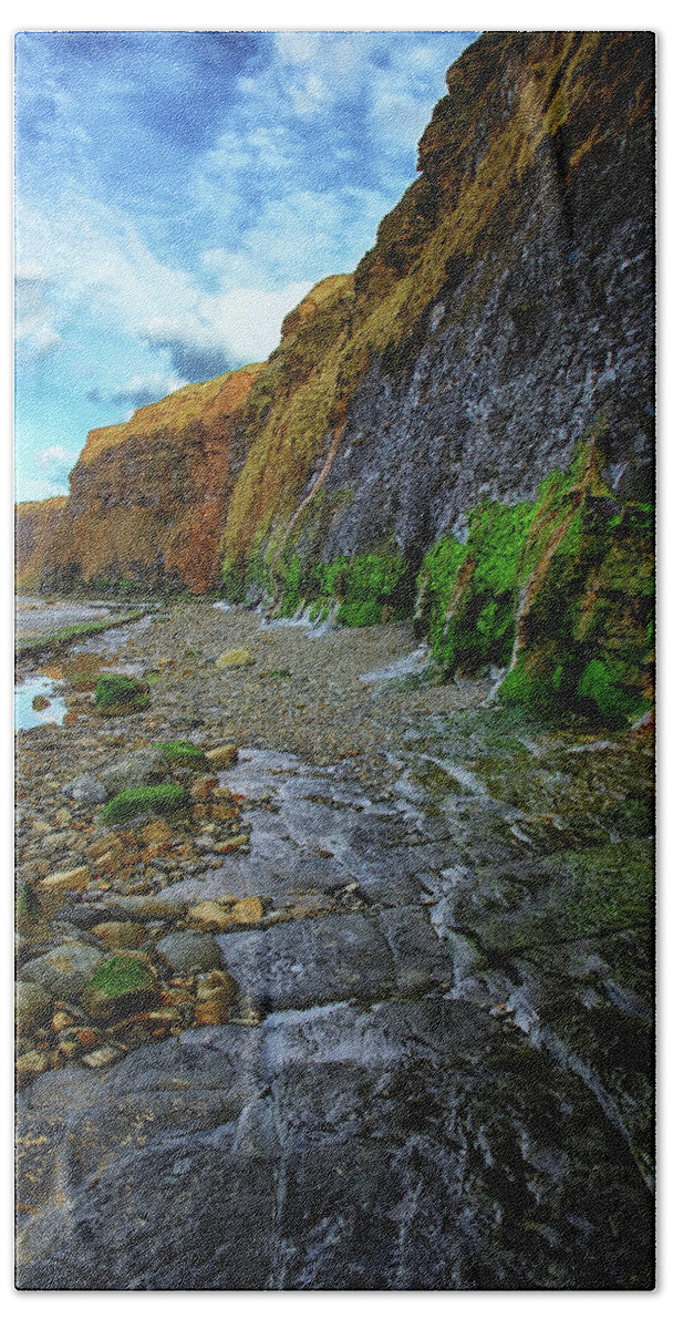 Cliffs Bath Towel featuring the photograph The Tide is Out Along the Cliffs by Jeff Townsend