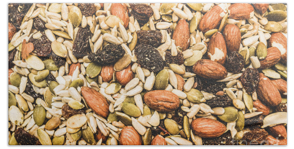 Almonds Hand Towel featuring the photograph Trail mix background by Jorgo Photography