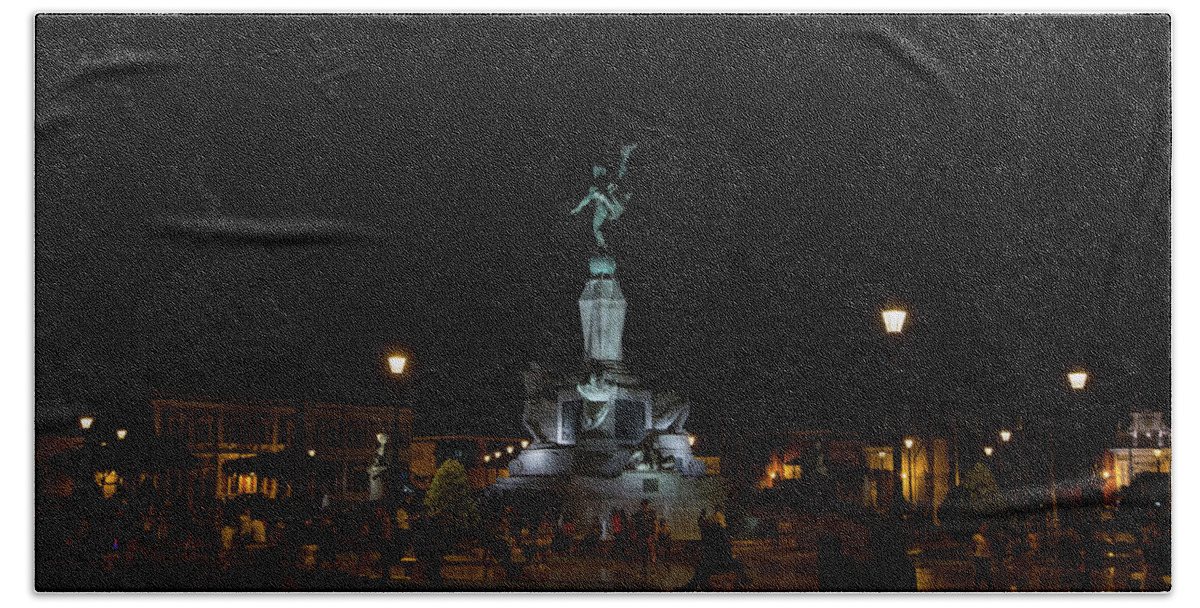At Night Bath Towel featuring the digital art Trjillo Plaza de Armas at night by Carol Ailles