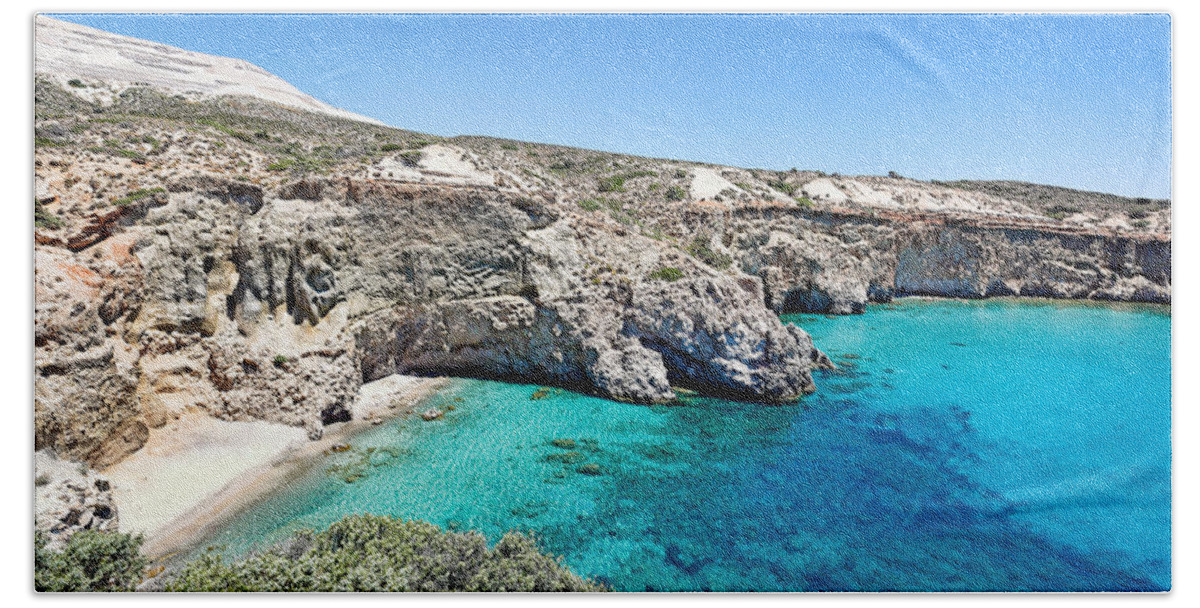 Milos Bath Towel featuring the photograph Tsigrado beach in Milos - Greece by Constantinos Iliopoulos