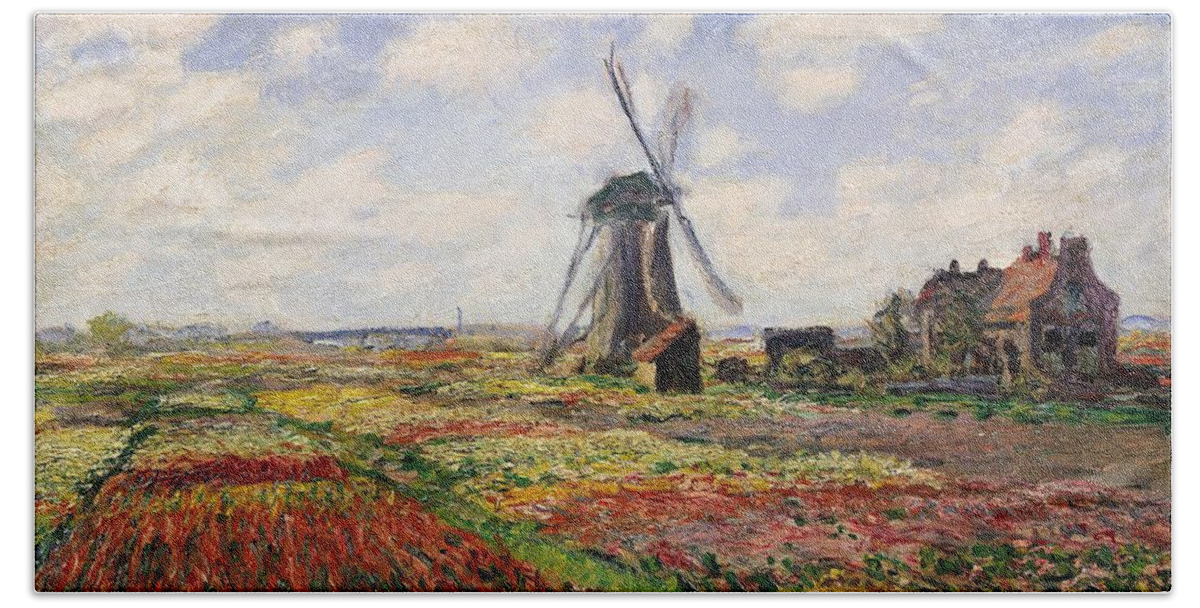 Claude Monet Hand Towel featuring the painting Tulip Fields with the Rijnsburg Windmill by Claude Monet