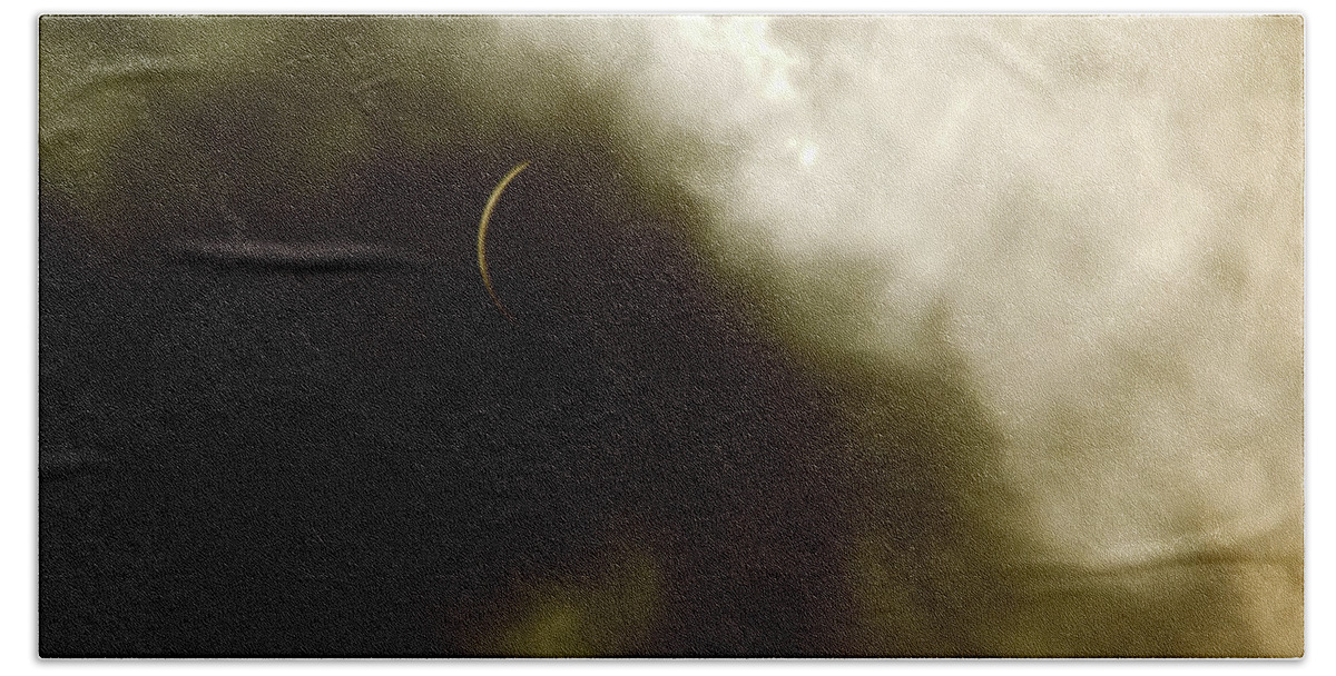 Solor Hand Towel featuring the photograph Turbulent Sky With a Solar Eclipse by Larry Jost