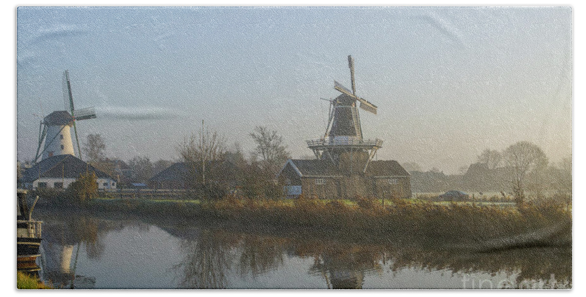 Netherlands Hand Towel featuring the photograph Two dutch windmills in the fog by Patricia Hofmeester