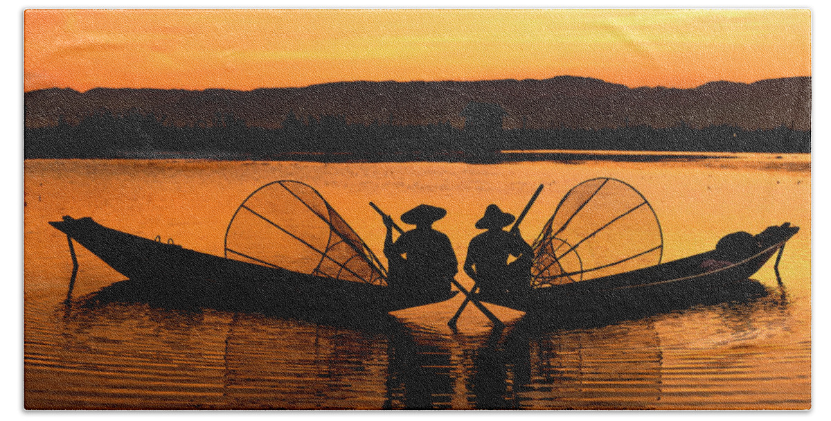 Travel Hand Towel featuring the photograph Two fisherman at sunset by Pradeep Raja Prints