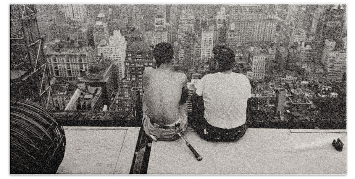 New York City Bath Towel featuring the photograph Two Men Sitting on a Scaffold Overlooking Manhattan by Nat Herz