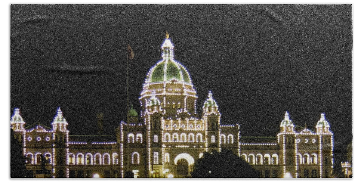 Night Lights Bath Towel featuring the photograph Victoria Legislative Buildings by Betty Buller Whitehead