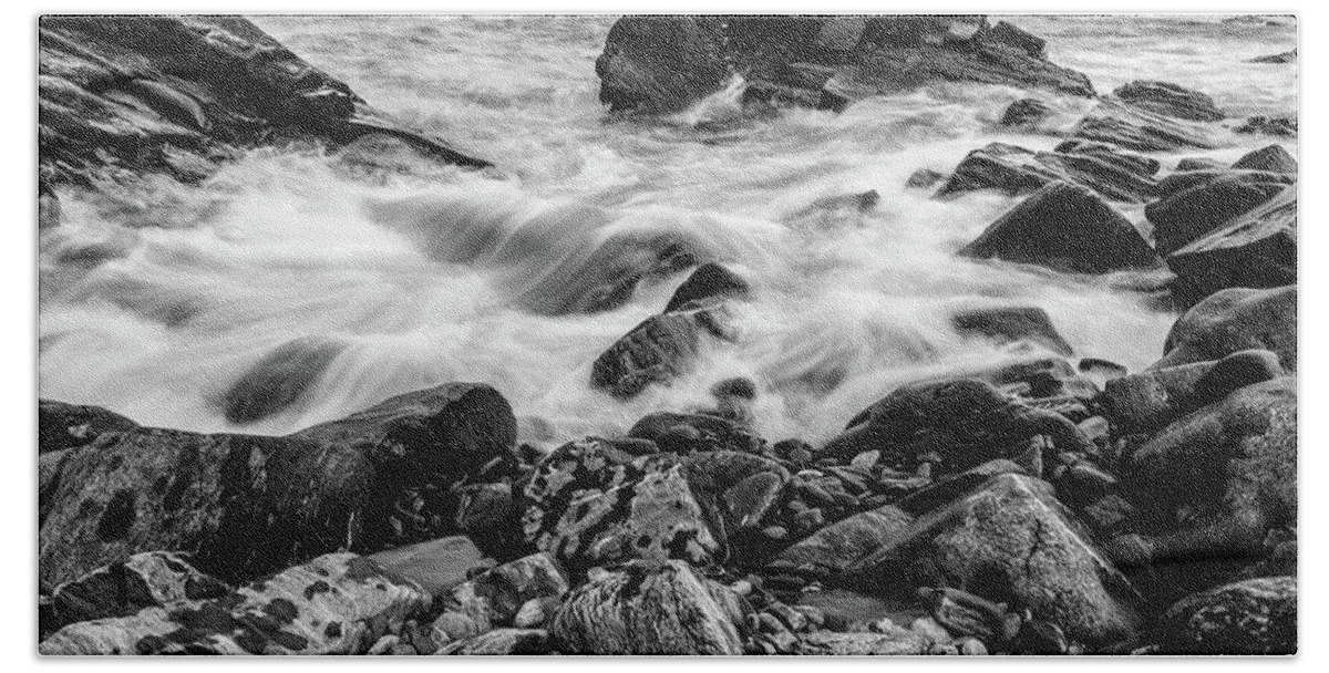Black And White Bath Towel featuring the photograph Waves Against a Rocky Shore in BW by Doug Camara